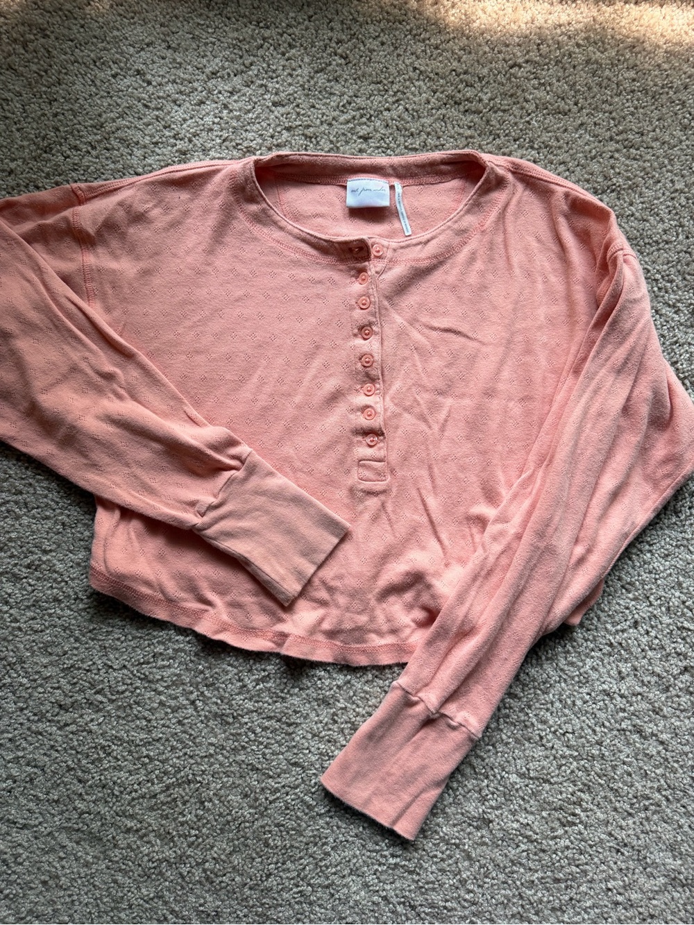 Out from under soft peach lounge shirt